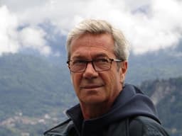 gray-haired-man-mountains